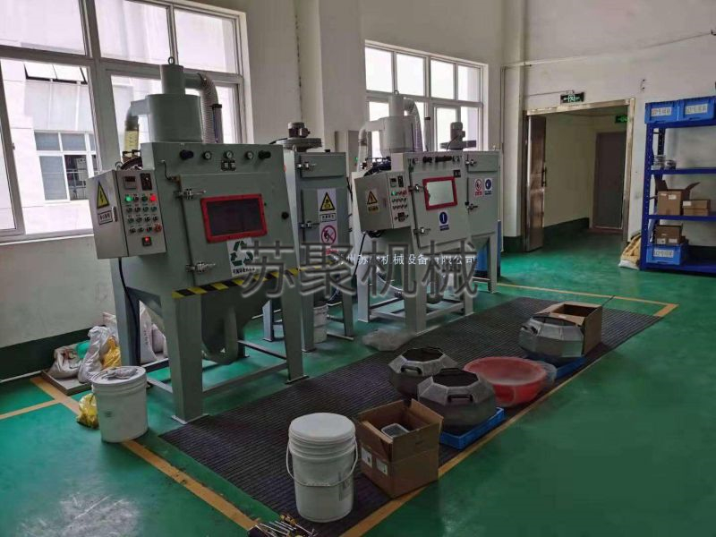 兩臺自動滾筒噴砂機客戶使用現(xiàn)場